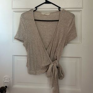 Urban outfitters cross over cream shirt